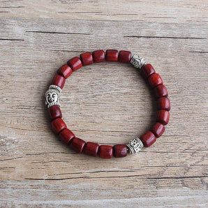 Bracelet Bouddha perles en bois cylindrique