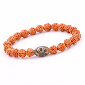 Bracelet en graines de Rudraksha et œil de Dzi