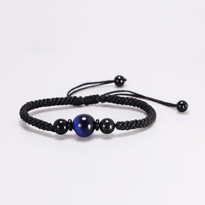 Bracelet Shamballa Œil de tigre bleu sur cordon tissé