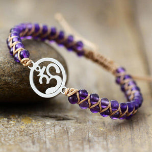 Bracelet zen en Améthyste et son symbole Om