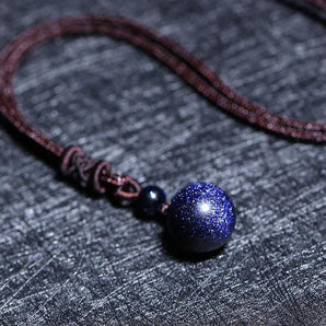 Pendentif boules en gré bleu